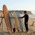 Pile of diferent types of surboard